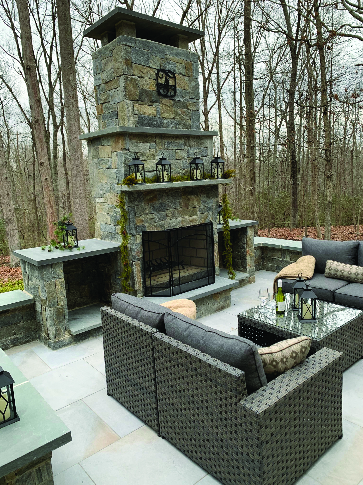 Outdoor fireplace featuring Ocean Blue Ledgestone from Natural Facing