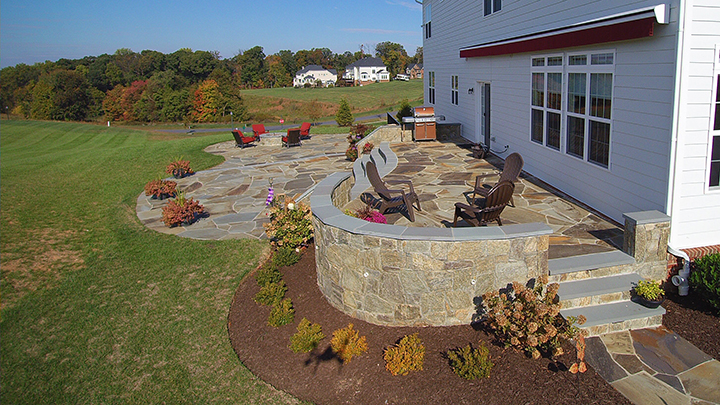 Natural Facing Ramone Brown Mosaic Natural Stone Veneer installed on a garden wall