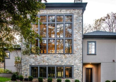 Natural Facing real stone veneer custom crystal creek ledgestone blend installed on a home exterior