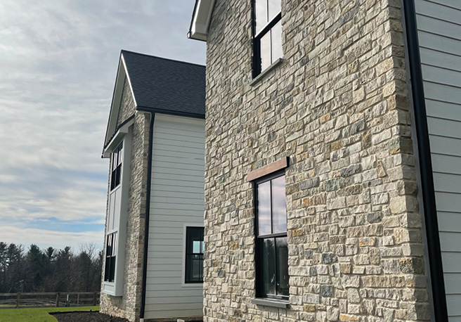 Stone veneer installed on the exterior of a residence