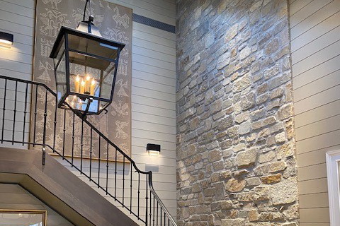 Crystal Creek Ledgestone from Natural Facing real stone veneer installed on near a staircase