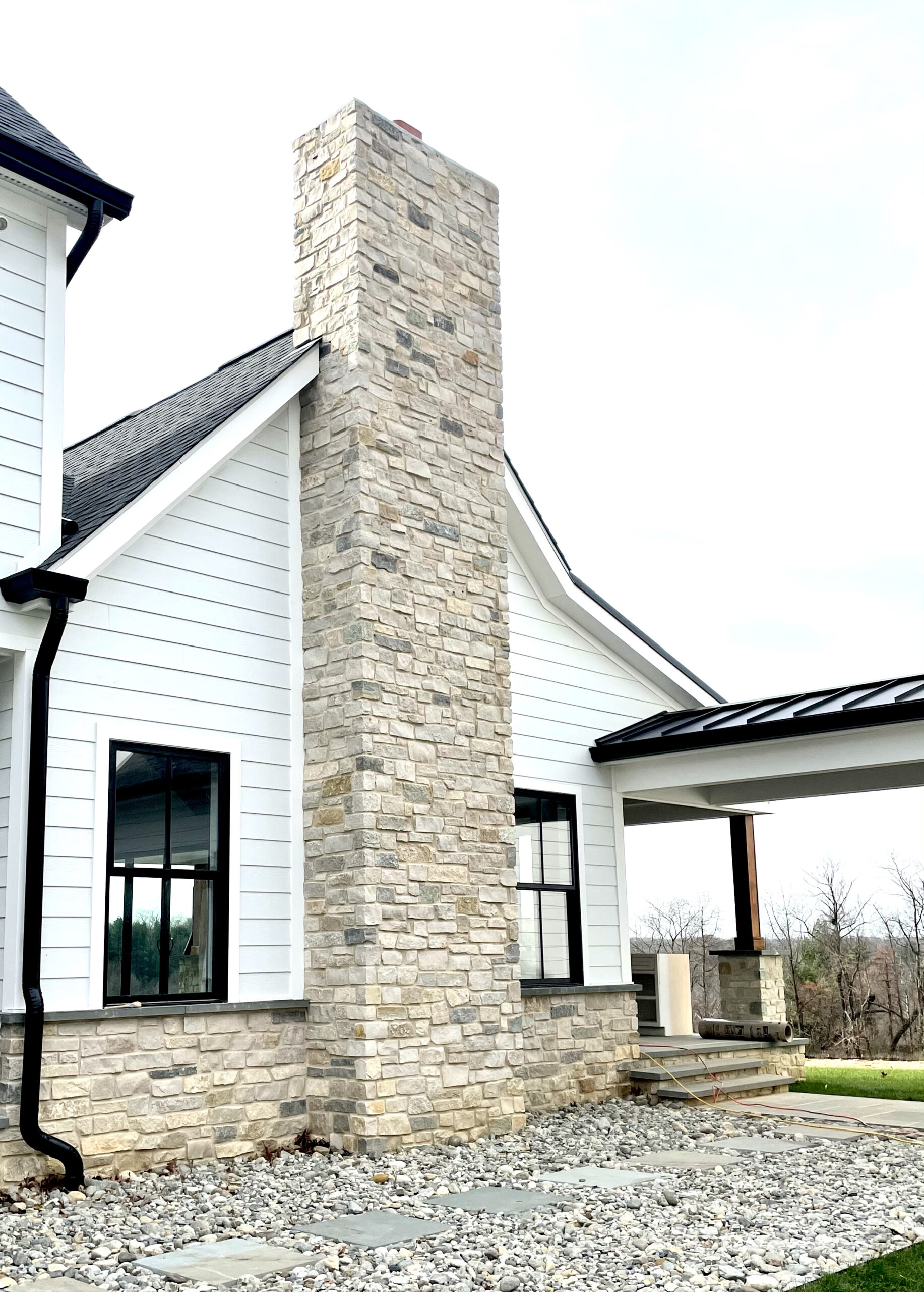 Bauer House featuring Natural Facing Pinehurst Ledgestone chimney detail