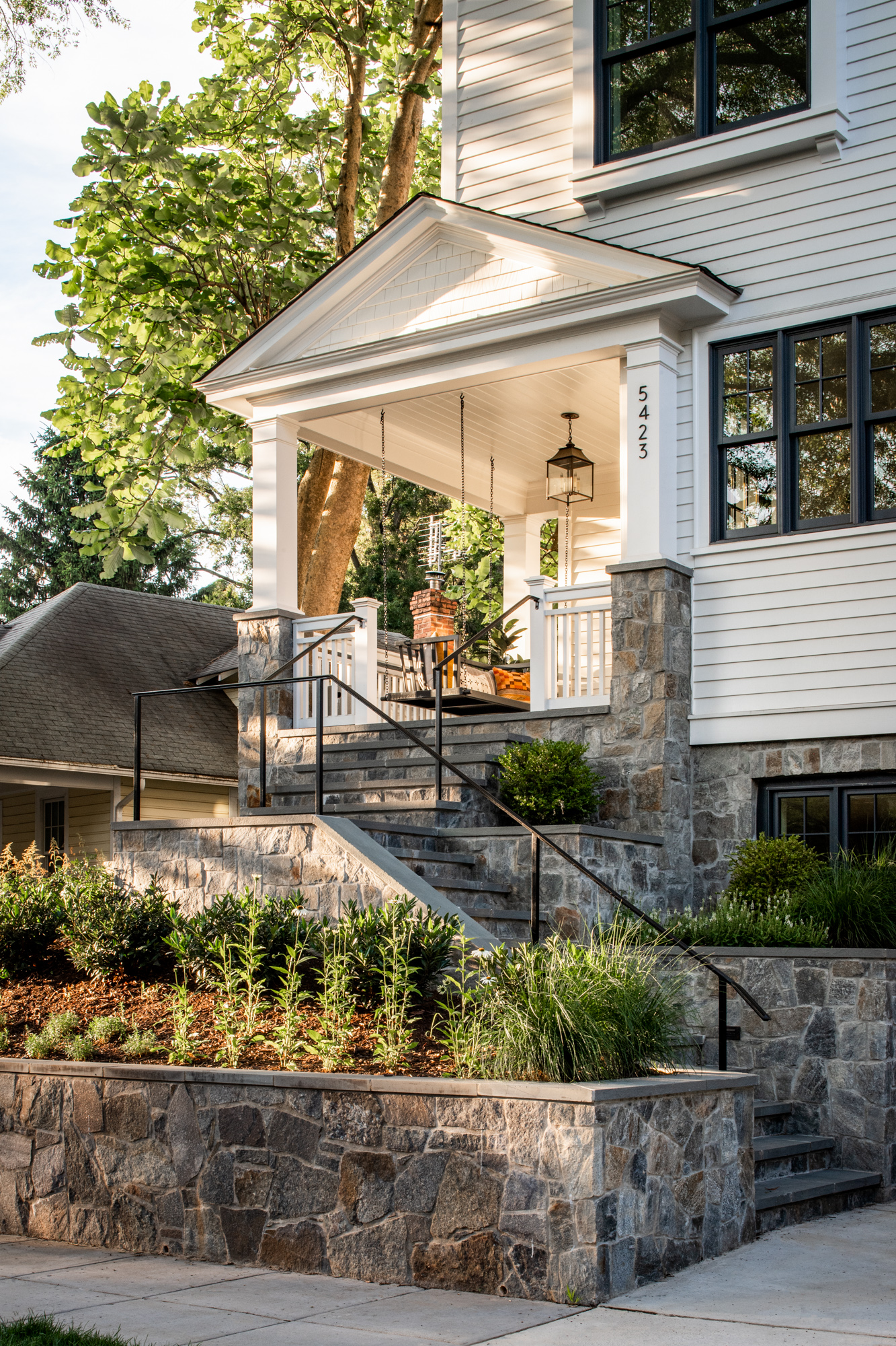 Autumn Crest Mosaic house with retaining wall