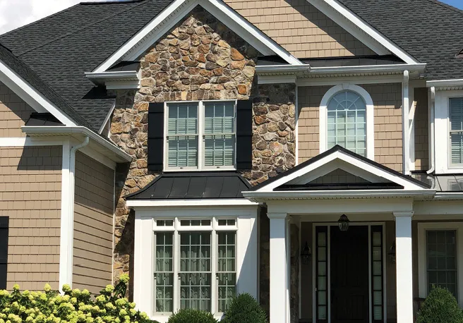 Home exterior with natural stone veneer